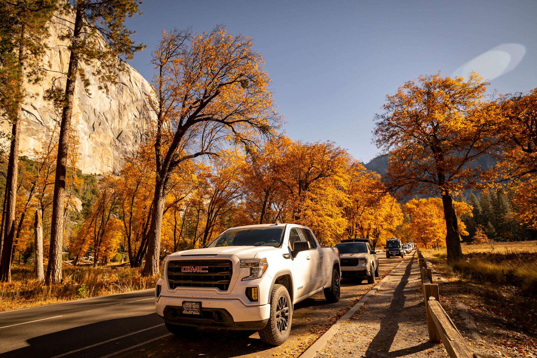 GMC Sierra truck on autumn road