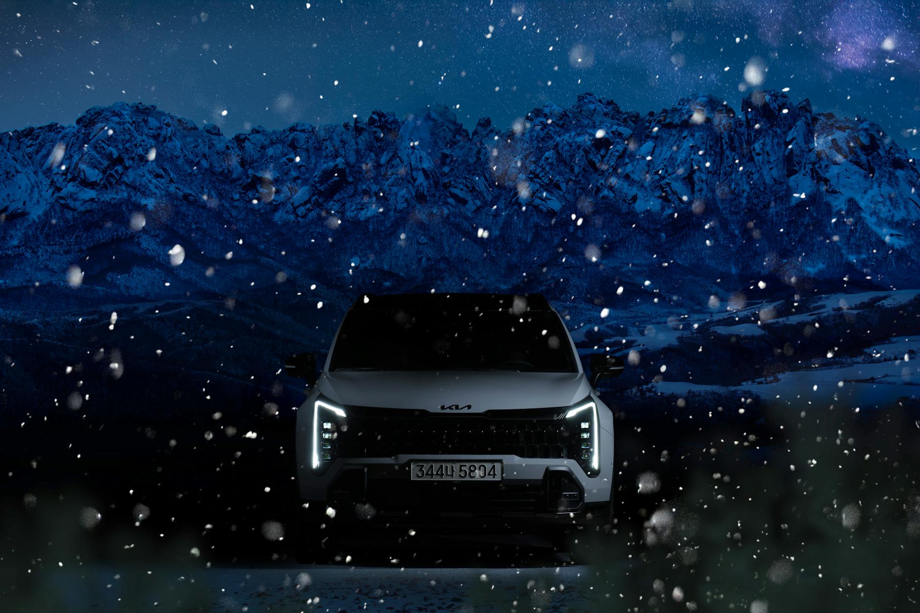 Kia Telluride SUV in snowy mountains